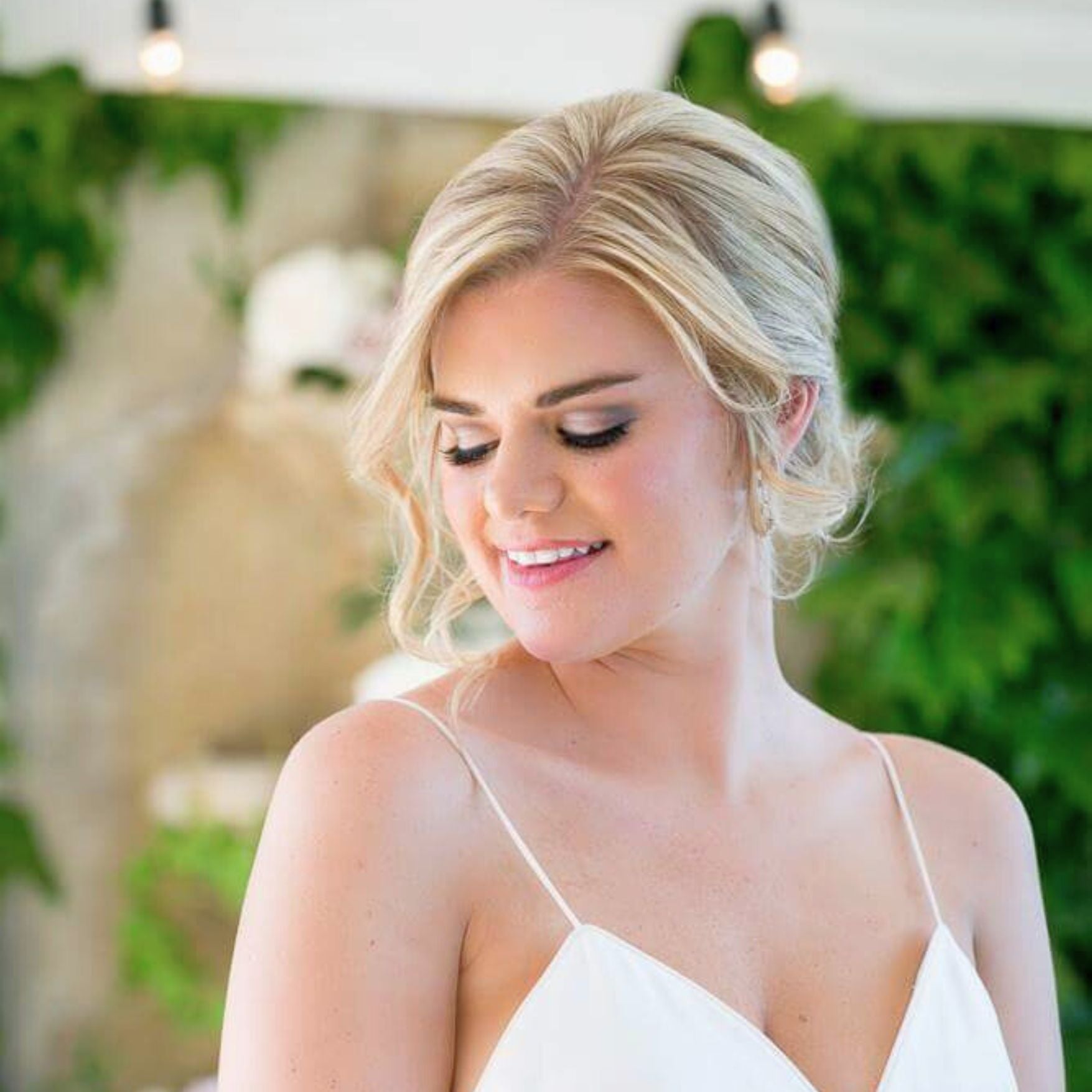 Bride model showcasing hair and makeup services for special events