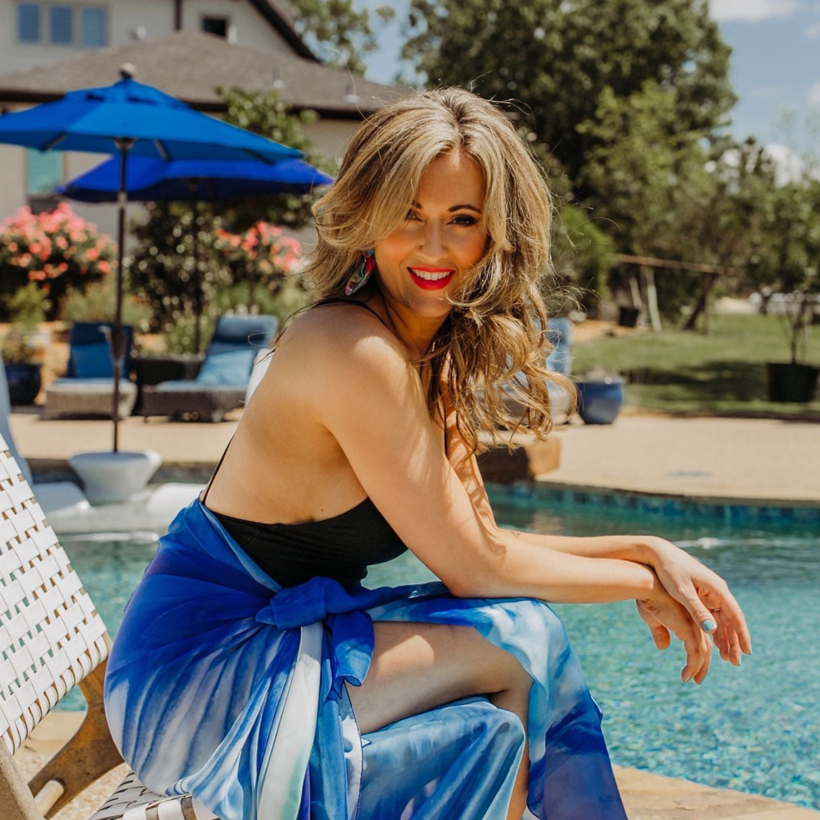 Model next to pool - Hair and makeup services in DFW