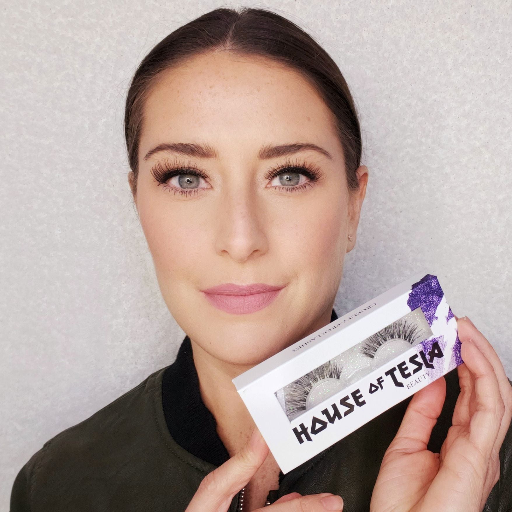 House of Tesla Natural Lashes in packaging with model